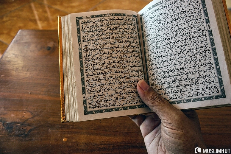 quran book hand islam holy book